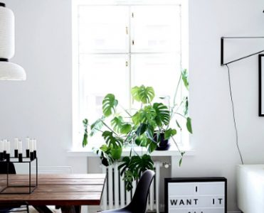 Monochromatic Apartment in Helsinki with Unique Contemporary Lighting